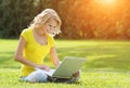 Girl with laptop. Blonde beautiful young woman with notebook Royalty Free Stock Photo