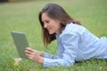 girl on laptop on grass Royalty Free Stock Photo