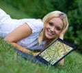 Girl with laptop outside