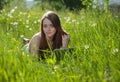 Girl with laptop in a park