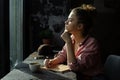 Girl by the window in a cafe