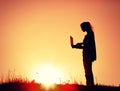 Girl with laptop on sunset Royalty Free Stock Photo