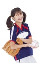 Girl laughing while holding softball and mitt, isolated Royalty Free Stock Photo