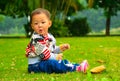 A girl on the lawn(Asia, China, Chinese) Royalty Free Stock Photo