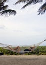 Girl laying at the beach in a hammock Royalty Free Stock Photo