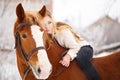 Girl laying on horse neck. Friendship background Royalty Free Stock Photo