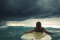 girl laying on a surfboard Royalty Free Stock Photo