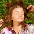 The girl lays on a grass a meadow Royalty Free Stock Photo