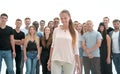 girl leader standing in front of a casual group of young people. Royalty Free Stock Photo