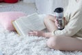 Girl leafing through a book closeup