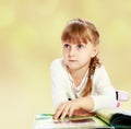 Girl leafing through the book.