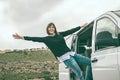 Girl leaning out of the door of a van Royalty Free Stock Photo