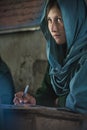 Girl learning in the only school in the village of Shimshal 3100m is a government school taught by teachers based in the village