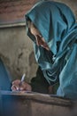 Girl learning in the only school in the village of Shimshal 3100m is a government school taught by teachers based in the village