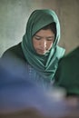 Girl learning in the only school in the village of Shimshal 3100m is a government school taught by teachers based in the village