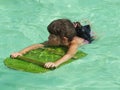 Girl learning to swim