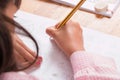 Girl learning to write Royalty Free Stock Photo