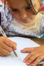 Girl learning to write Royalty Free Stock Photo