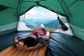 Girl lies in they tent Royalty Free Stock Photo