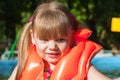 Girl in a life jacket smiling Royalty Free Stock Photo