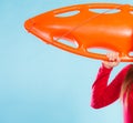 Girl lifeguard with equipment float