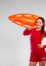 Girl lifeguard with equipment float