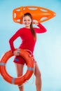 Girl lifeguard with rescue equipment Royalty Free Stock Photo
