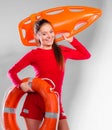 Girl lifeguard with rescue equipment Royalty Free Stock Photo