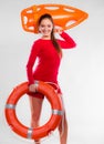 Girl lifeguard with rescue equipment Royalty Free Stock Photo