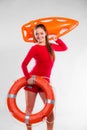 Girl lifeguard with rescue equipment