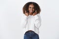 Girl really likes plan gives thumbs-up recommends. Portrait alluring friendly african-american woman wear sweater show