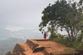 Girl on Lion's rock in Sigiriya, Sri Lanka Royalty Free Stock Photo