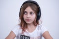 Girl listening a music on headphone