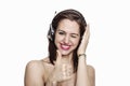 Girl listening to music with thumbs up