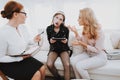 Girl Listens to Music in Psychologist Office. Royalty Free Stock Photo