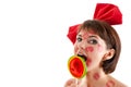 Girl with lollipop in mouth in lipstick kisses Royalty Free Stock Photo