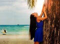 A Girl With Long Dark Hair On A Sandy Wild Beach. Royalty Free Stock Photo