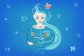 Girl with long hair and an aquarium with gold, red fish. A woman makes a wish, dreams, zodiac sign Pisces. Royalty Free Stock Photo