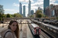 girl in long hair blonde with sweatshirt on Chicago train station bridge Royalty Free Stock Photo