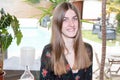 Girl with long hair at home front of house pool Royalty Free Stock Photo