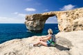 Girl looking on Azure Window on Gozo Island Royalty Free Stock Photo