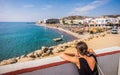 Girl looking at Kardamena beach, Kos, Greece