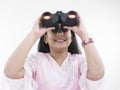 Girl looking through the binocular