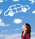 Girl looking at car cloud on a blue sky Royalty Free Stock Photo