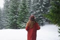 Girl looking on mountain view wearing hat