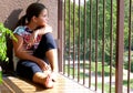 Girl looking out the balcony Royalty Free Stock Photo