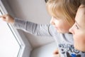 Girl looking out of window