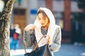 Girl looking for something in a bag Royalty Free Stock Photo