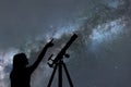 Girl looking at the stars. Telescope Milky Way Royalty Free Stock Photo