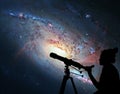 Girl looking at the stars with telescope. Spiral Galaxy M106